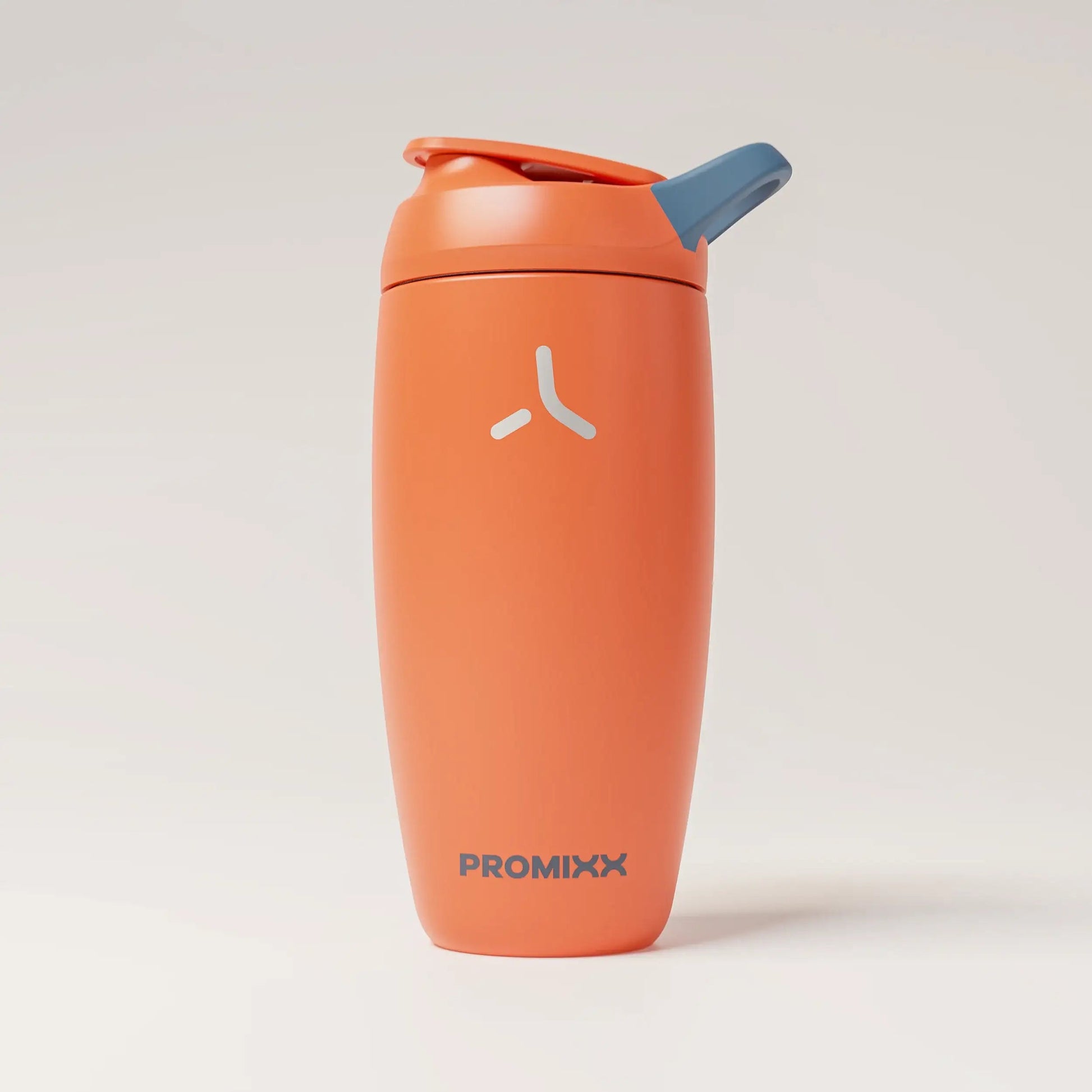 insulated-performance-shaker-bottle-b9 SHKR_18550_dwSS-S1.1_burntOrange_midnightBlue_1_1_hero_edit_98573fa4-4557-4dbd-9f16-b284eece3df3.png